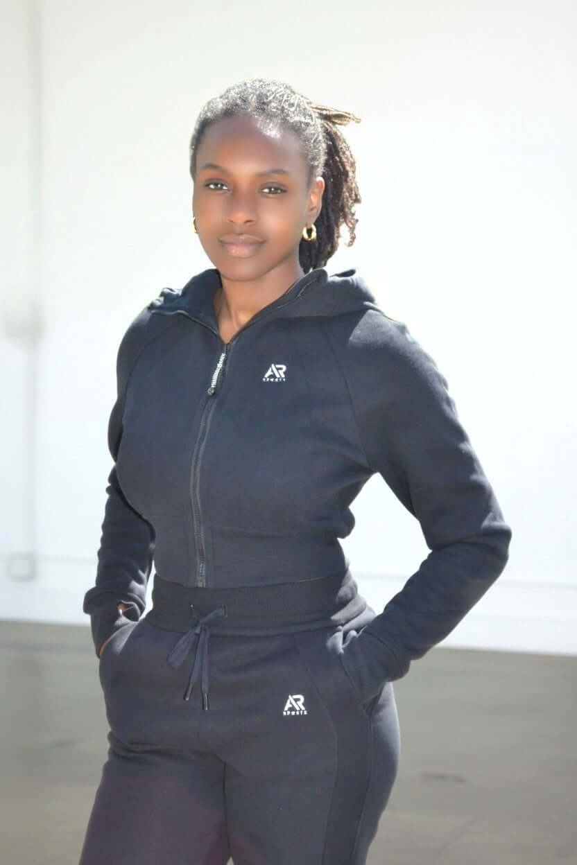 Women in a stylish women's 2pcs sweatsuit hoodie and joggers, showcasing comfort and modern fashion.