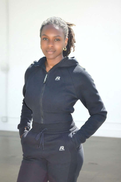 Women in a stylish women's 2pcs sweatsuit hoodie and joggers, showcasing comfort and modern fashion.
