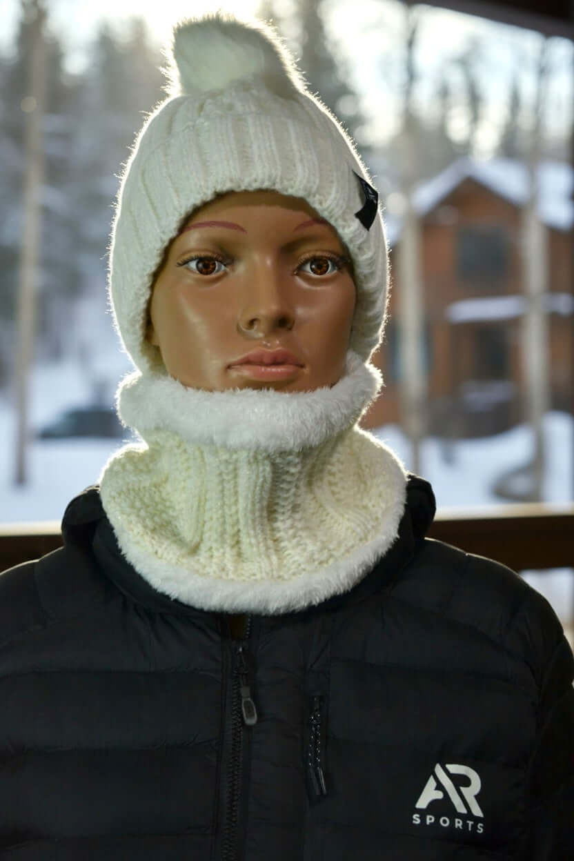 Women wearing a stylish Women's Winter Kiki Beanie & Neck Warmer set against a snowy background.