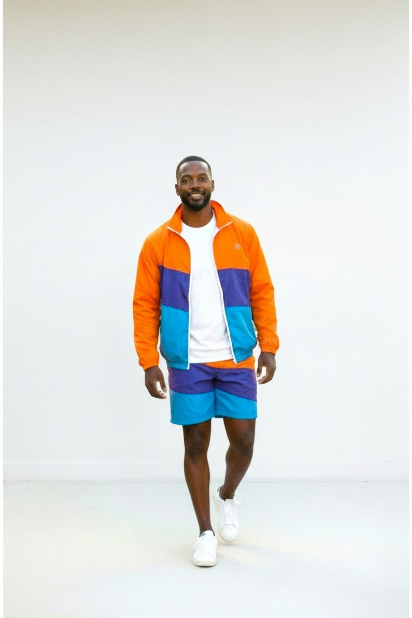 Men in a stylish orange and blue 2Pcs Zip Up Windbreaker jacket and shorts set, perfect for outdoor activities.
