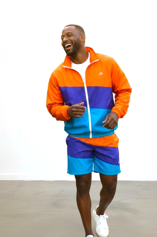Men's 2Pcs Zip Up Long Sleeve Windbreaker jackets with Matching Shorts in vibrant orange and blue.