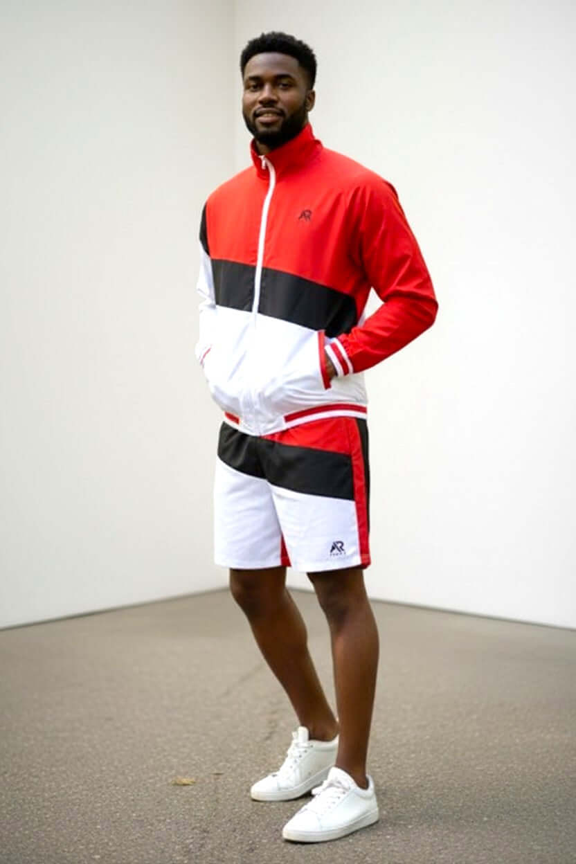 Men's tracksuit windbreaker jacket with matching shorts, perfect for active days.