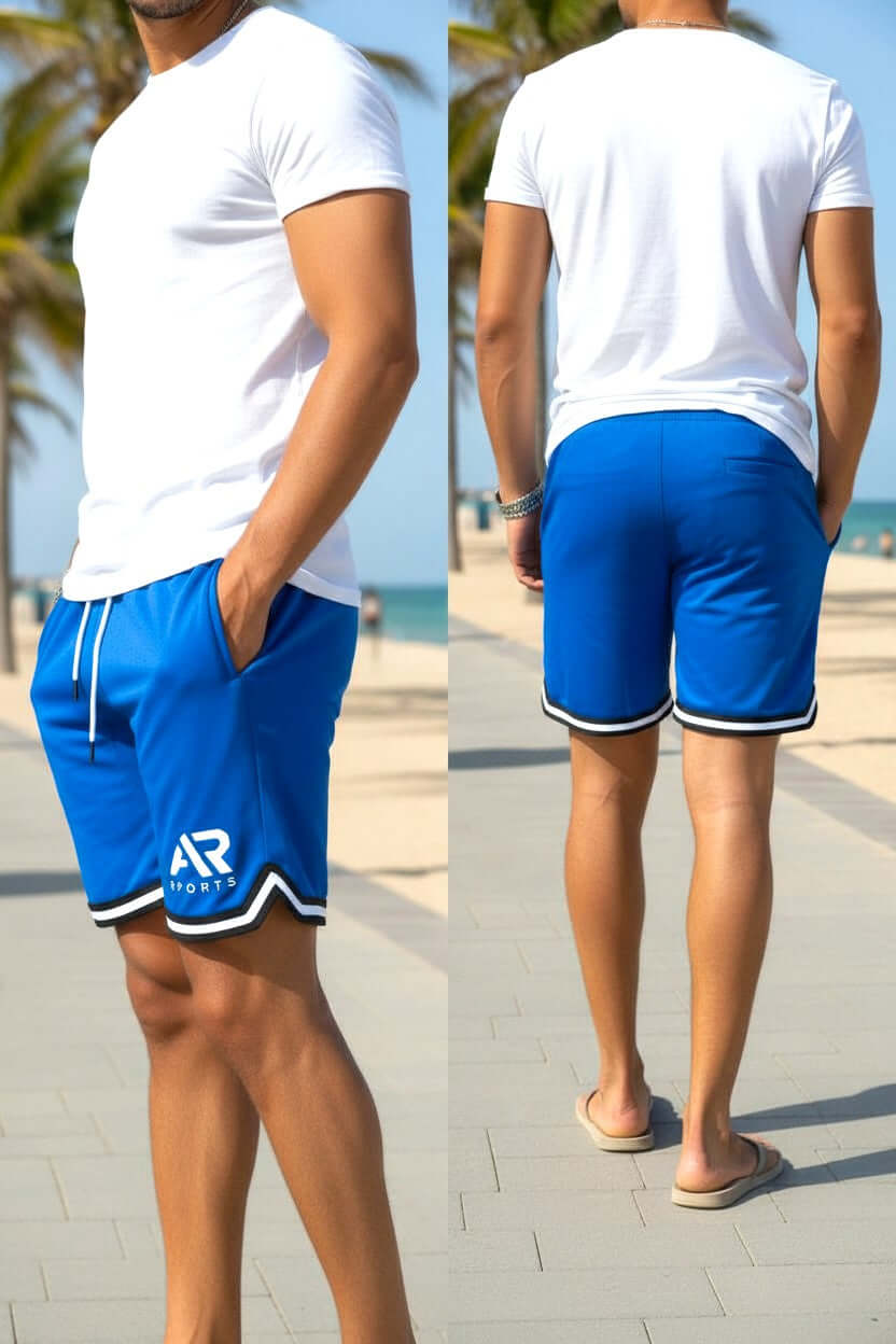 Men's Long Basketball & Gym Shorts in blue, showcasing style and comfort by the beach.