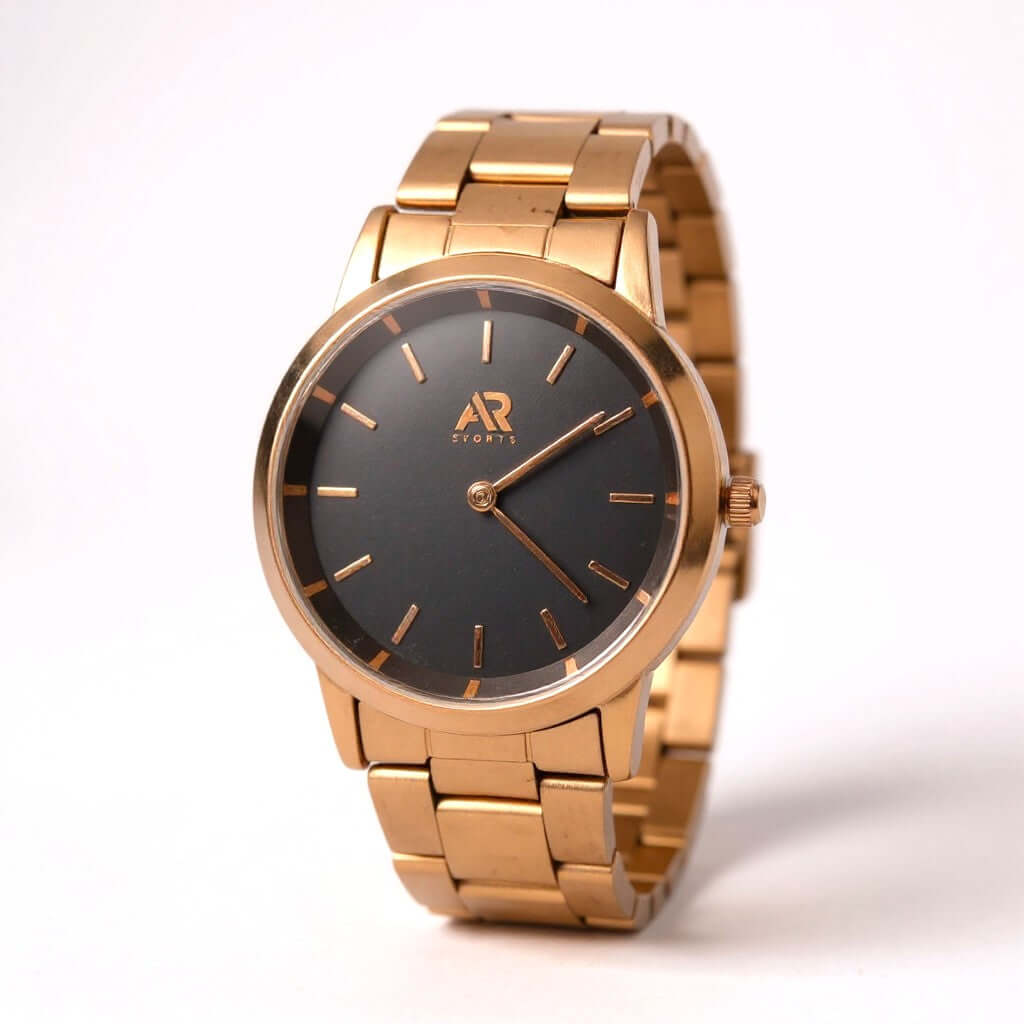 Wristwatch Timeless Rose Gold watch with a sleek black dial and elegant gold bracelet.
