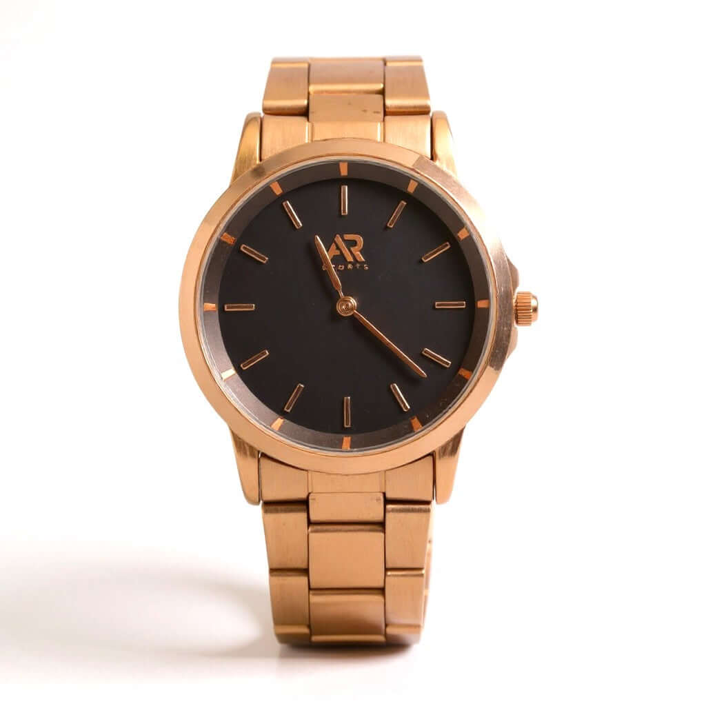 Wristwatch Timeless Rose Gold watch with black face and rose gold strap, an elegant accessory for any occasion.